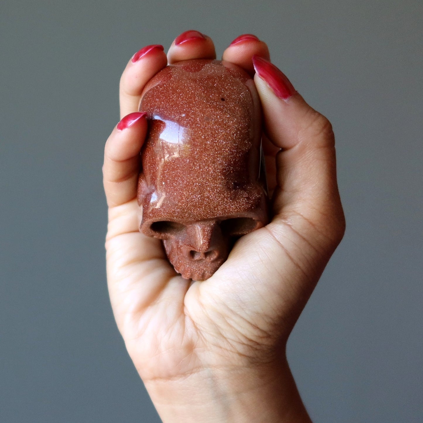 Goldstone Skull Make it or Break Brown Carving