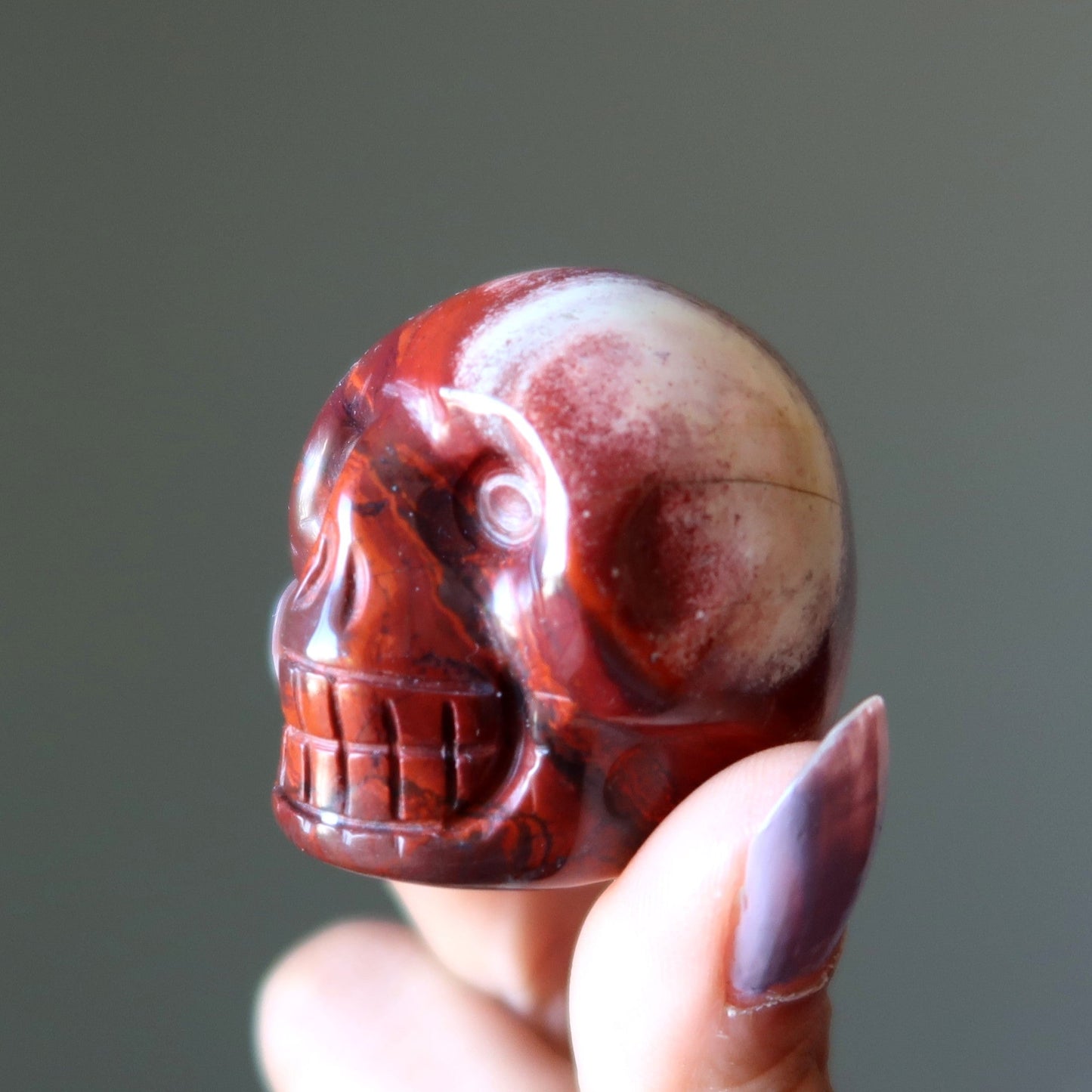 Red Jasper Skull All Smiles Metaphysical Stone Statue