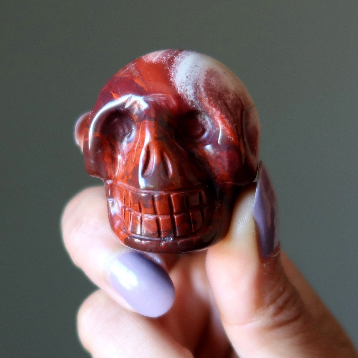 Red Jasper Skull All Smiles Metaphysical Stone Statue